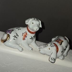 Rare Porcelain Regal Kutani Restin Dog Figures.